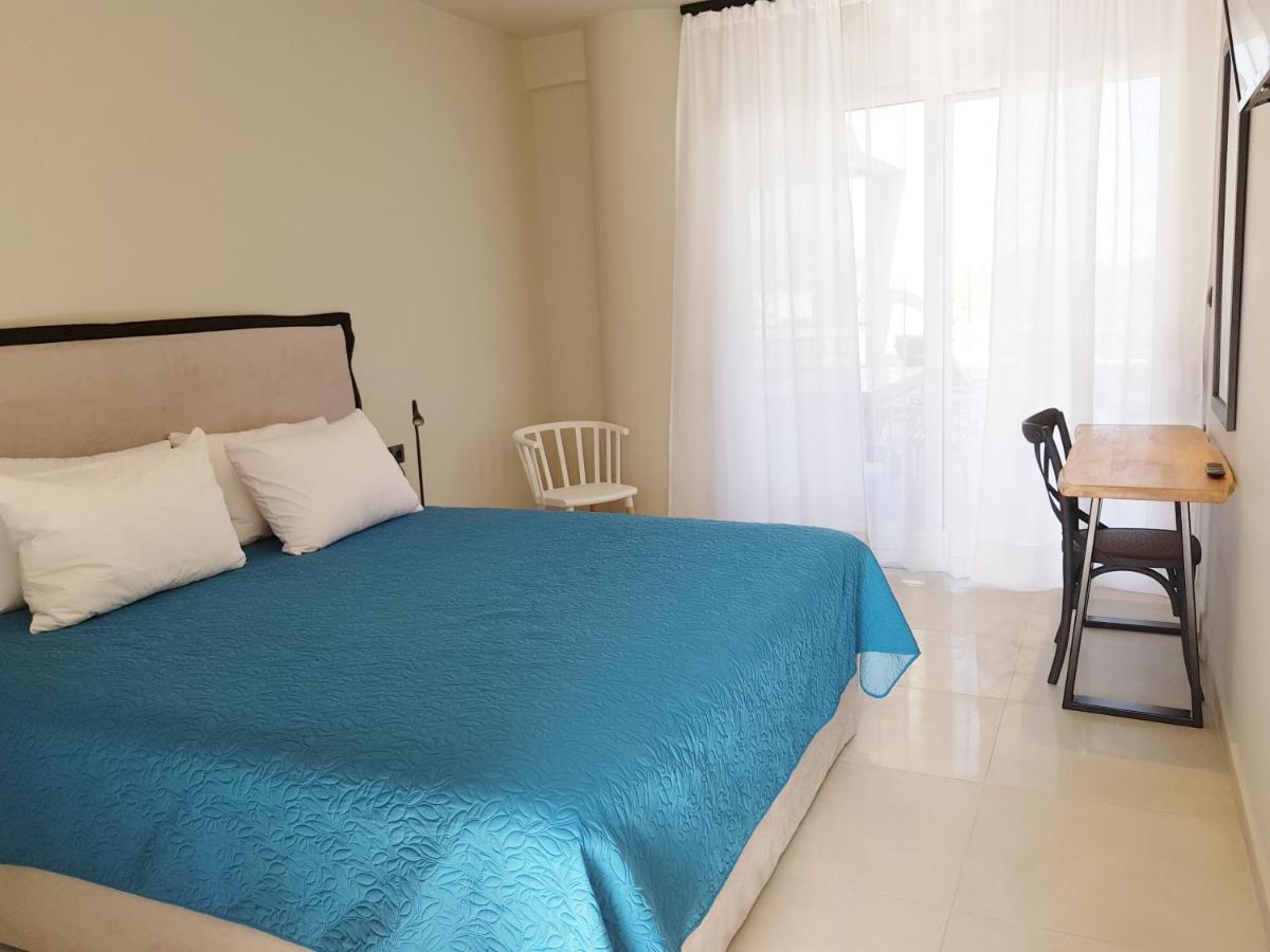 Houmas Apartments Yialos Bagian luar foto