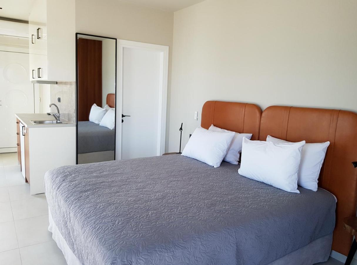 Houmas Apartments Yialos Bagian luar foto